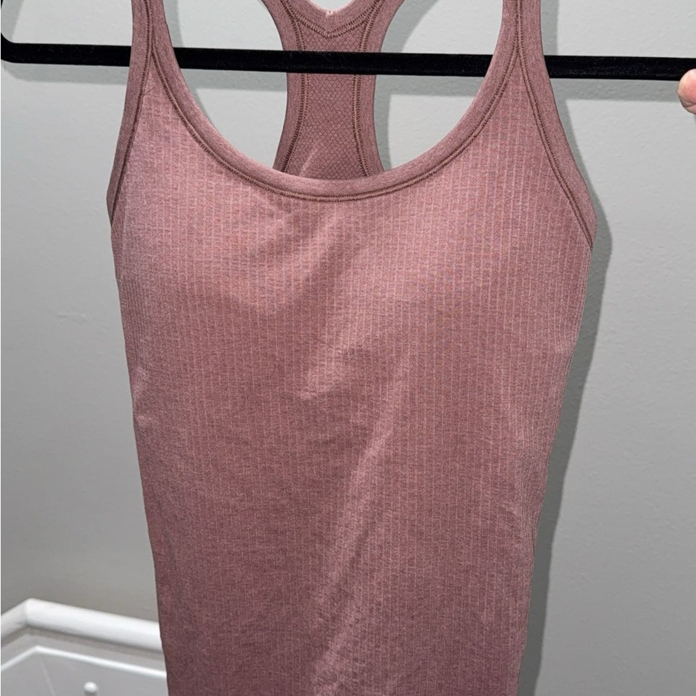 Lululemon Ebb To Street Tank II
Copper Coil size 6 Perfect Condition - Picture 9 of 12